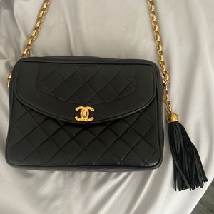 Vintage 1991 Chanel Coco Crush Camera shoulder bag in black lambskin leather.